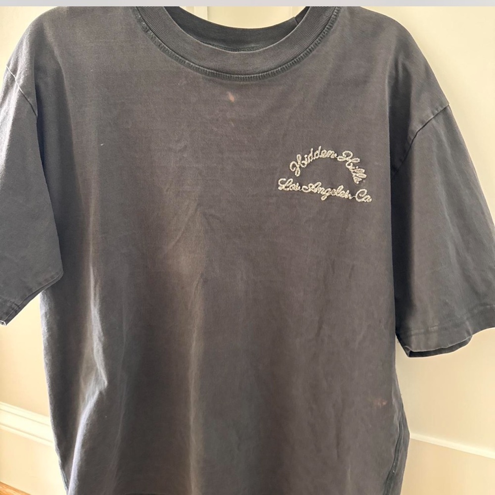 Men’s graphic tee size m (small bleach stain)